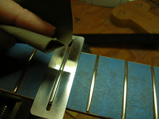 fret-polishing
